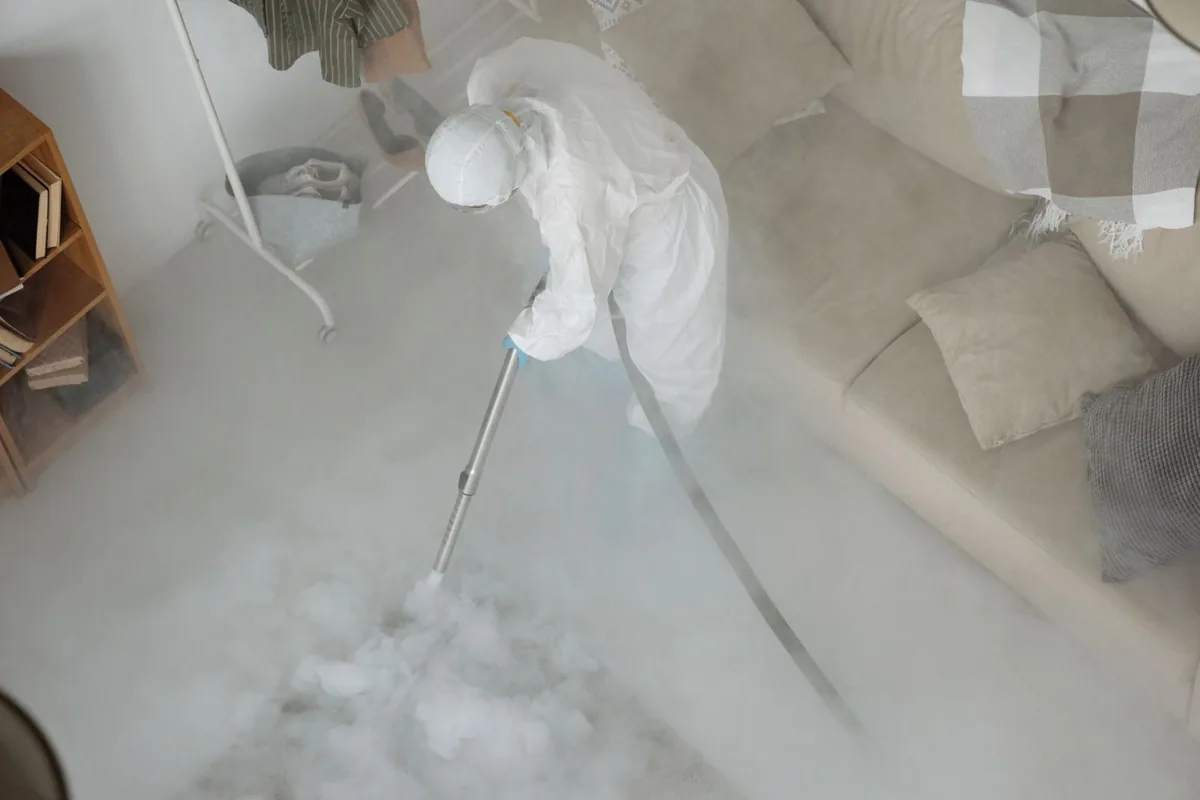 Biohazard cleanup technician in protective equipment, Sutter Creek, CA